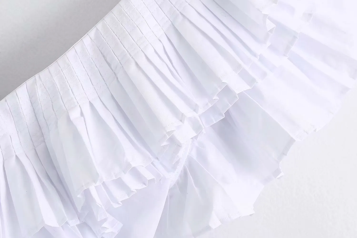 RUFFLED PLATTED BLOUSE