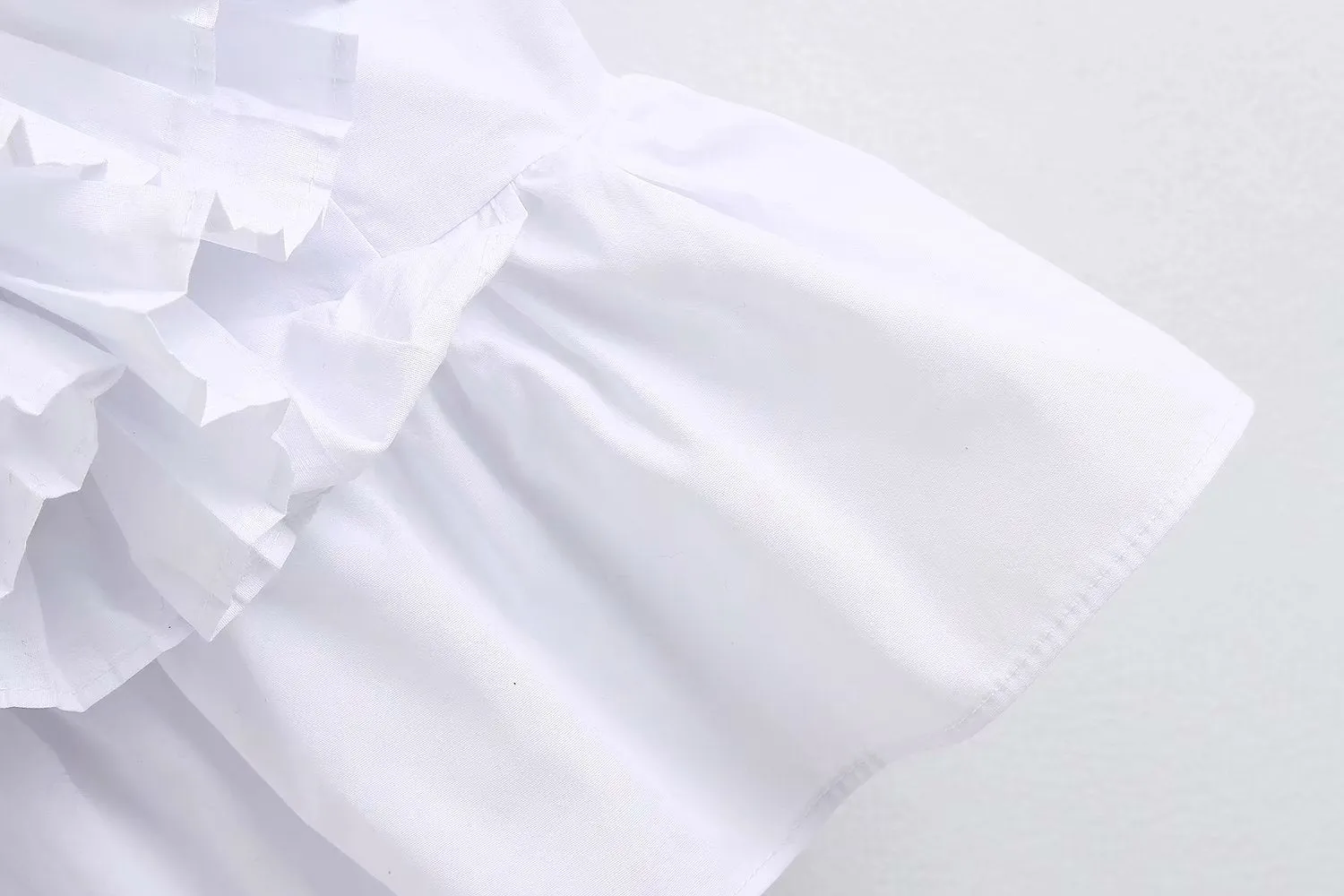 RUFFLED PLATTED BLOUSE